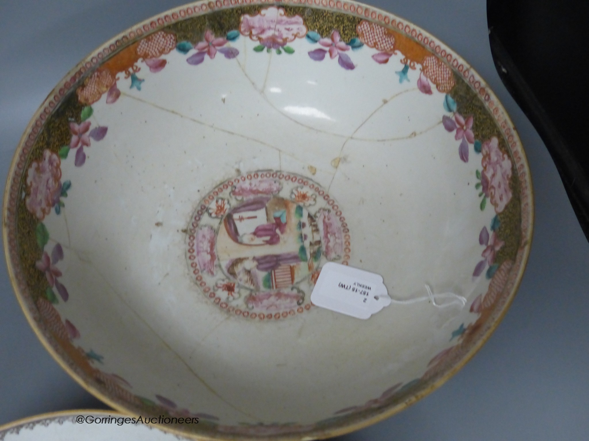 An 18th century Chinese Export famille rose punch bowl and another similar bowl (a.f.), largest 32cm diameter